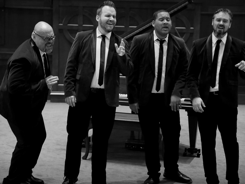 Coulee Classic Barbershop Quartet singers Matthew, Allen, Nate, and Colin at Cappella Performing Arts Center in La Crosse, Wisconsin.