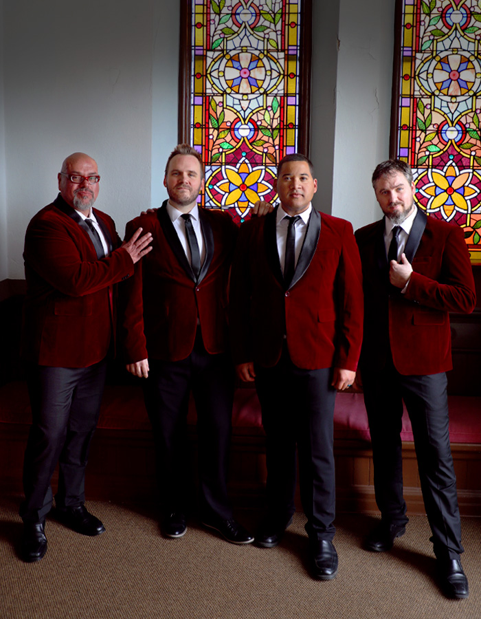 Coulee Classic Barbershop Quartet singers Matthew, Allen, Nate, and Colin at Cappella Performing Arts Center in La Crosse, Wisconsin.